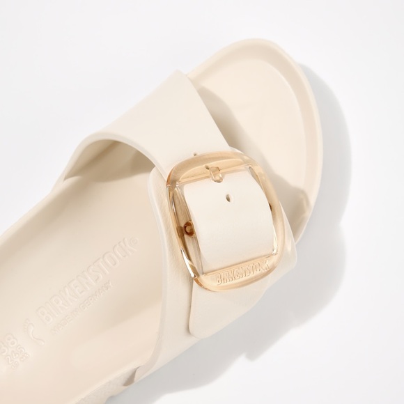 Birkenstock Shoes - Birkenstock Madrid Big Buckle EVA sandals in the color eggshell.